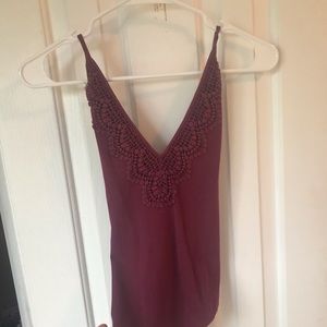 Wine colored V neck Body suit
